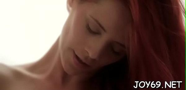  Sex-starved redhead bombshell Ariel is slowly taking off her panties